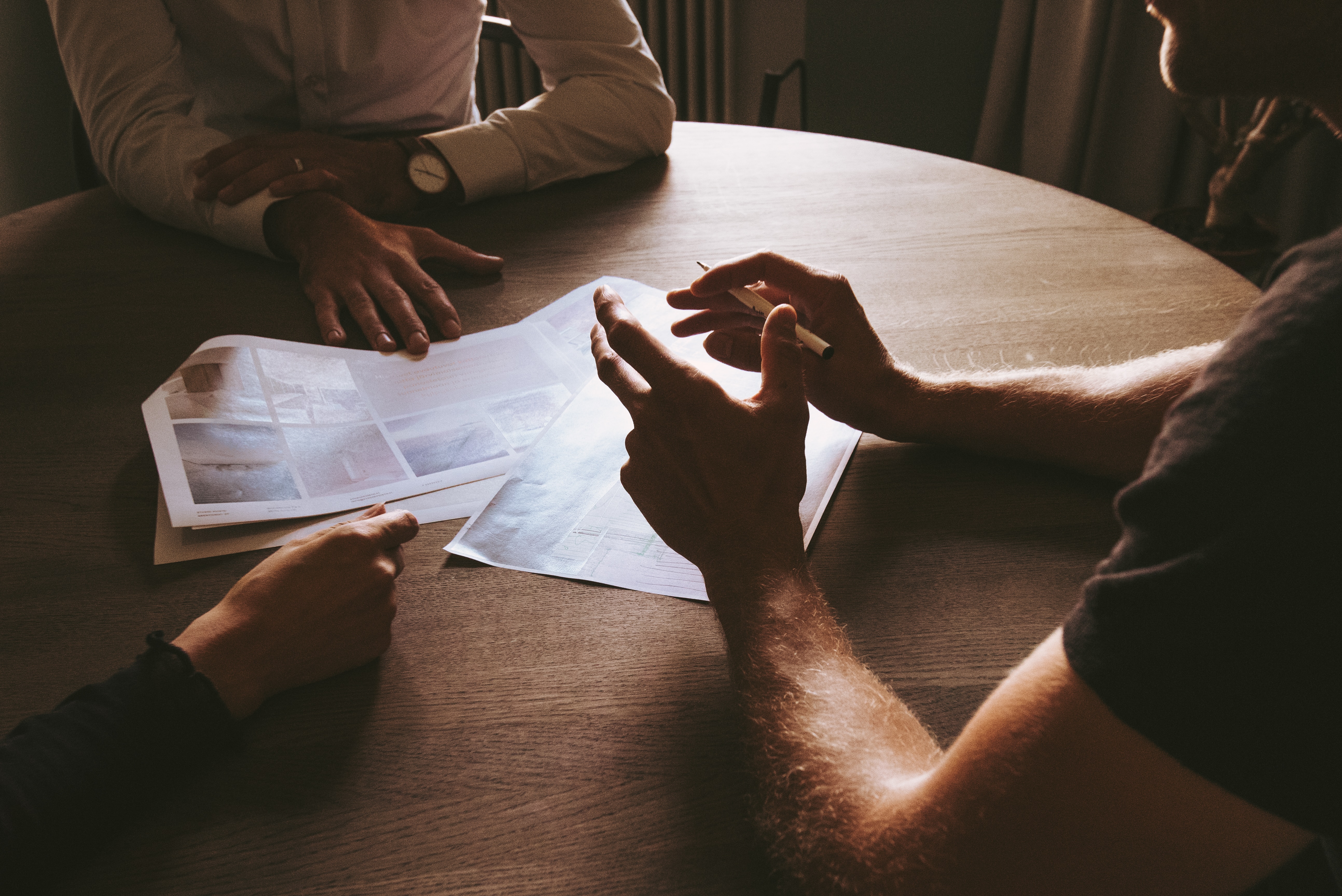 People around table having a meeting